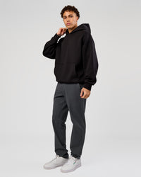 Man wearing Base Oversized Hoodie - Black | Model:Leandro | Size:M | | Thumbnail Index: 5