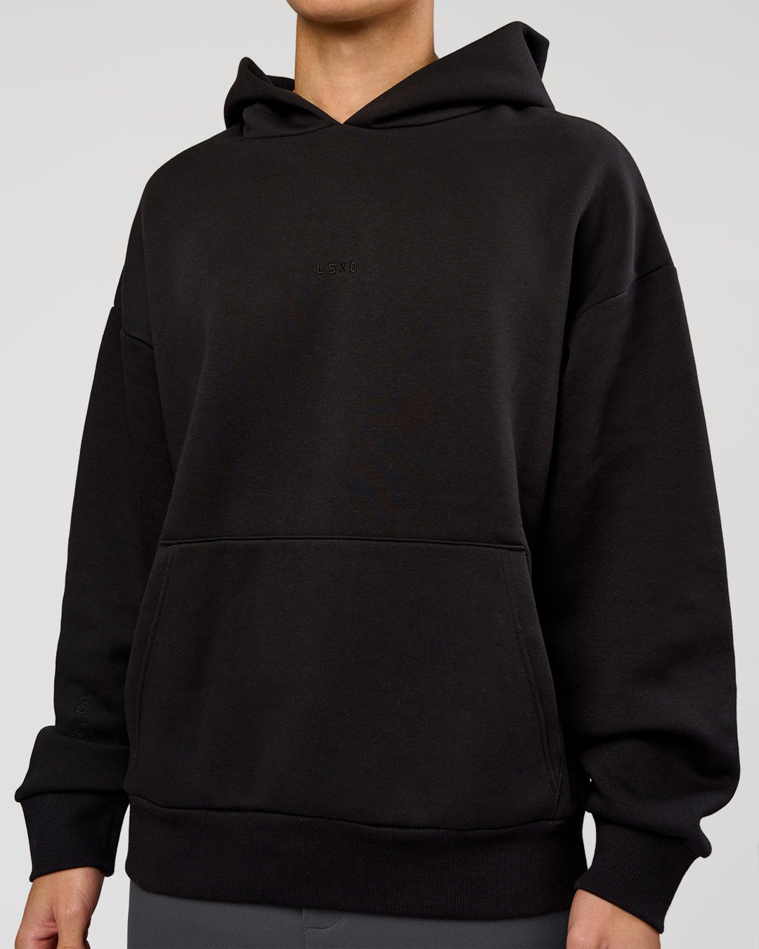 Man wearing Base Oversized Hoodie - Black | Model:Leandro | Size:M | - view 4