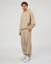 Man wearing Base Oversized Hoodie - Shale Beige | Model:Leandro | Size:M | | Thumbnail Index: 4