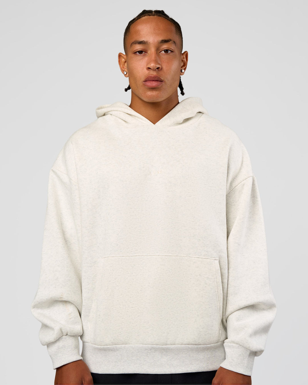 Man wearing Base Oversized Hoodie - Silver Marl | Model:Malebo | Size:M - view 1