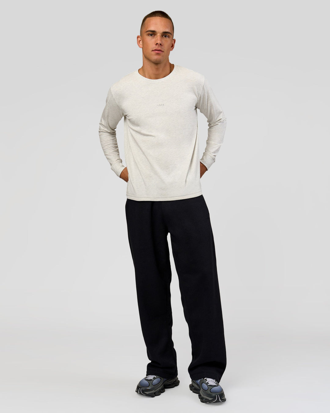 Man wearing Base Wide Leg Track Pant - Black | Model:Albert | Size:M | - view 2