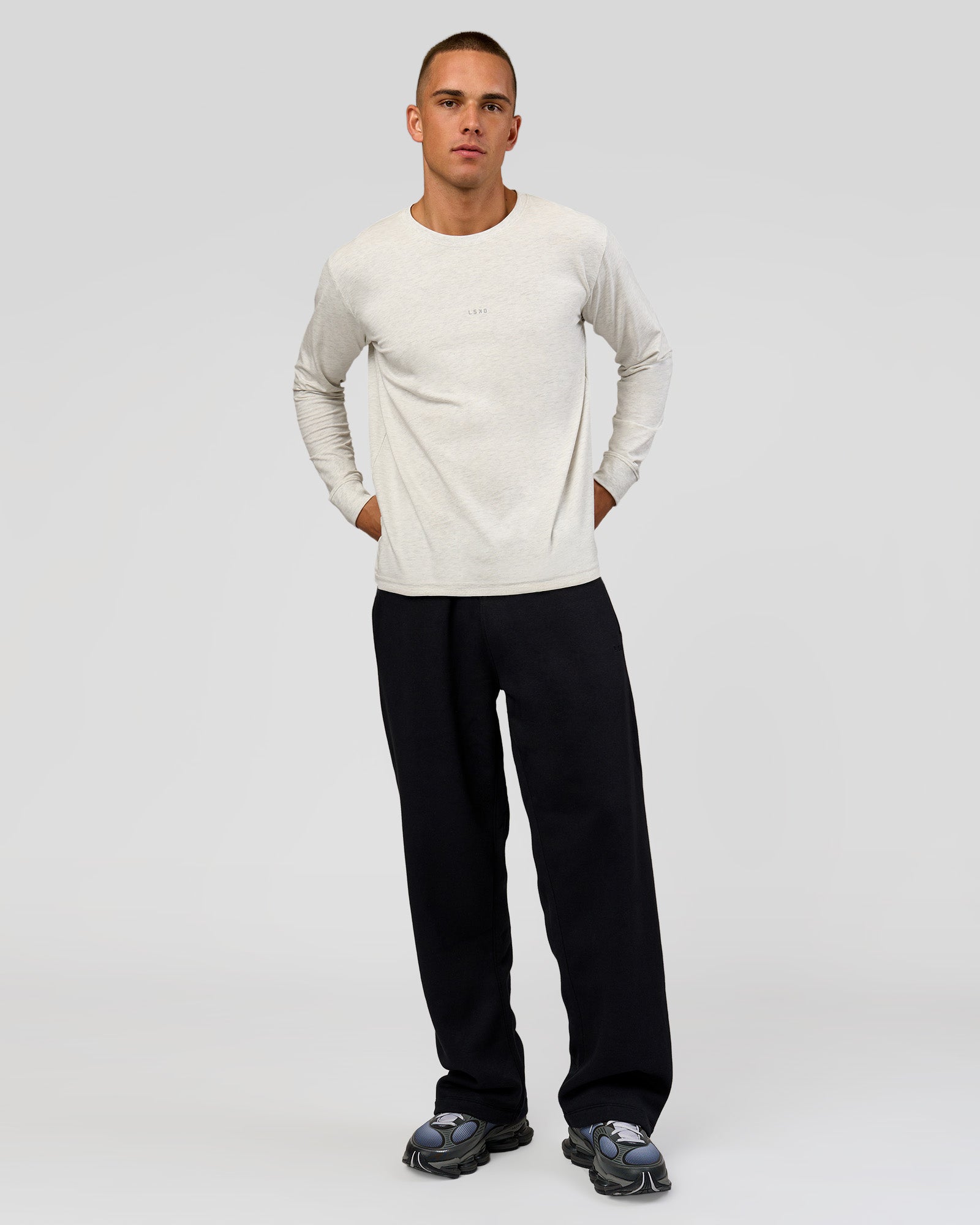 Man wearing Base Wide Leg Track Pant - Black | Model:Albert | Size:M |