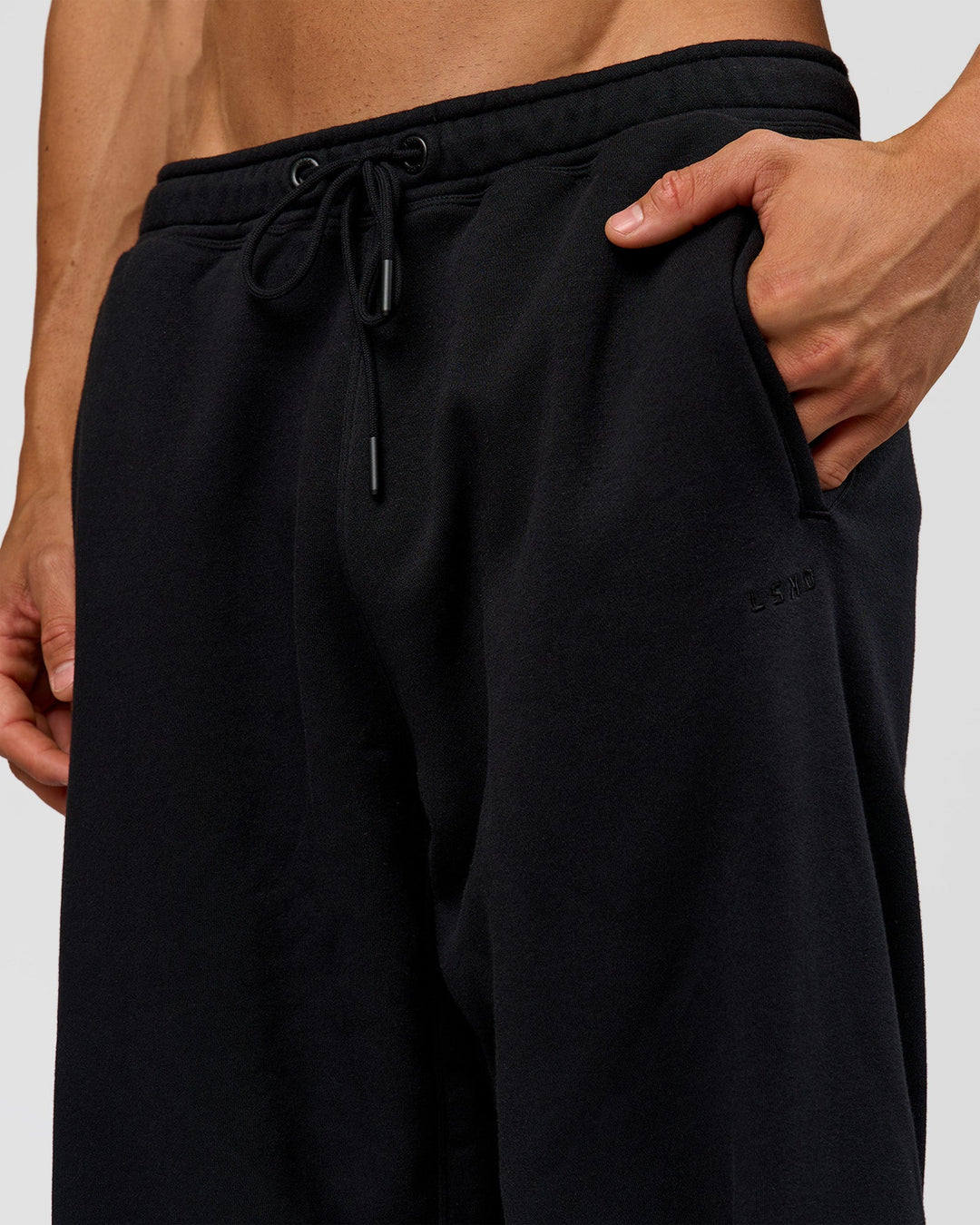 Man wearing Base Wide Leg Track Pant - Black | Model:Albert | Size:M | - view 4
