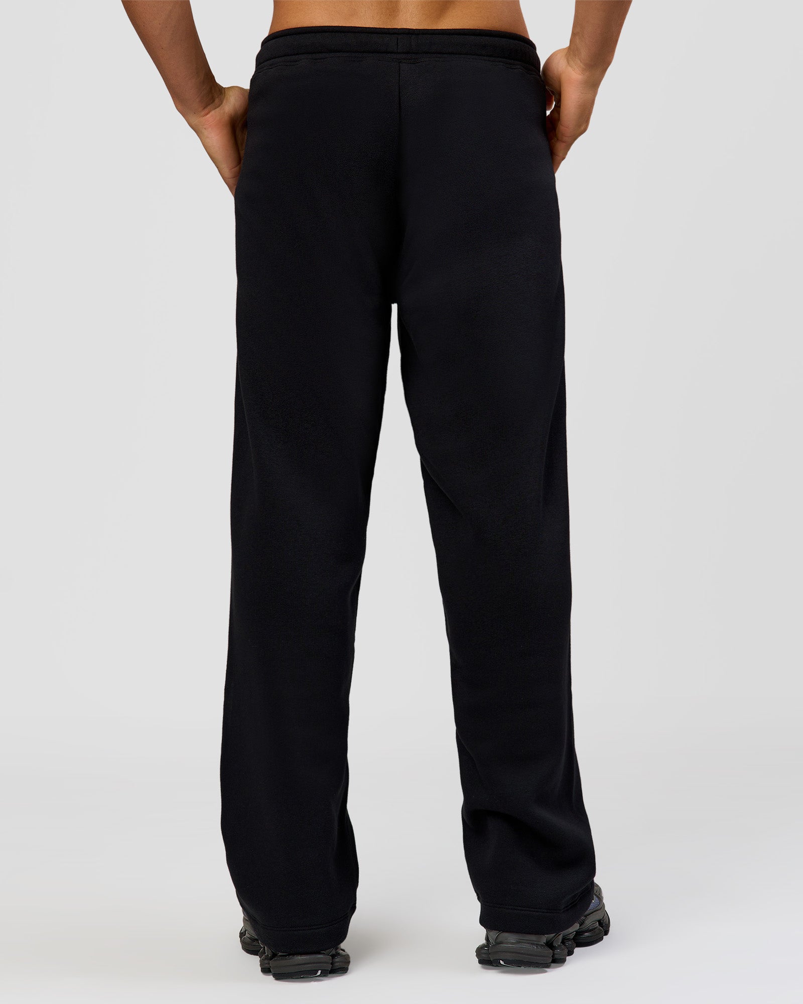 Man wearing Base Wide Leg Track Pant - Black | Model:Albert | Size:M |