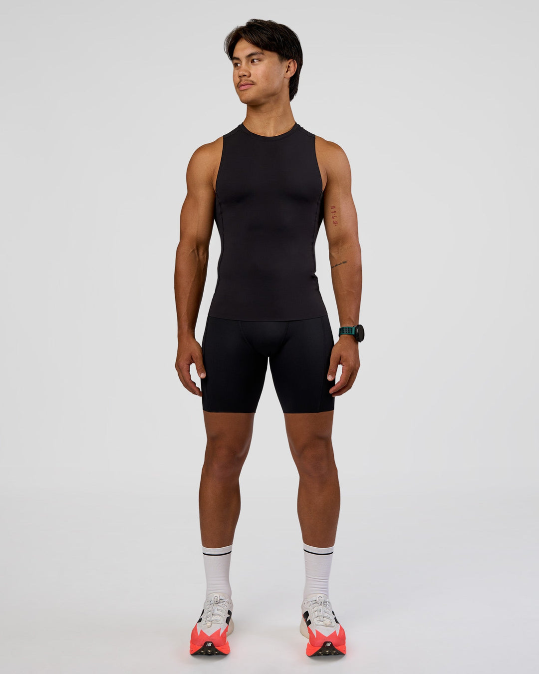 Man wearing BaseTech 8" Shorts - Black | Model:George | Size:M