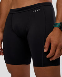 Man wearing BaseTech 8" Shorts - Black | Model:George | Size:M