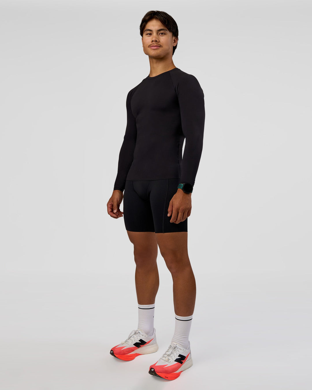 Man wearing BaseTech Long Sleeve Tee - Black | Model:George | Size:M