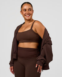 Woman wearing CF Move Through It Sports Bra - Hot Chocolate | Model:Simmy | Size:M