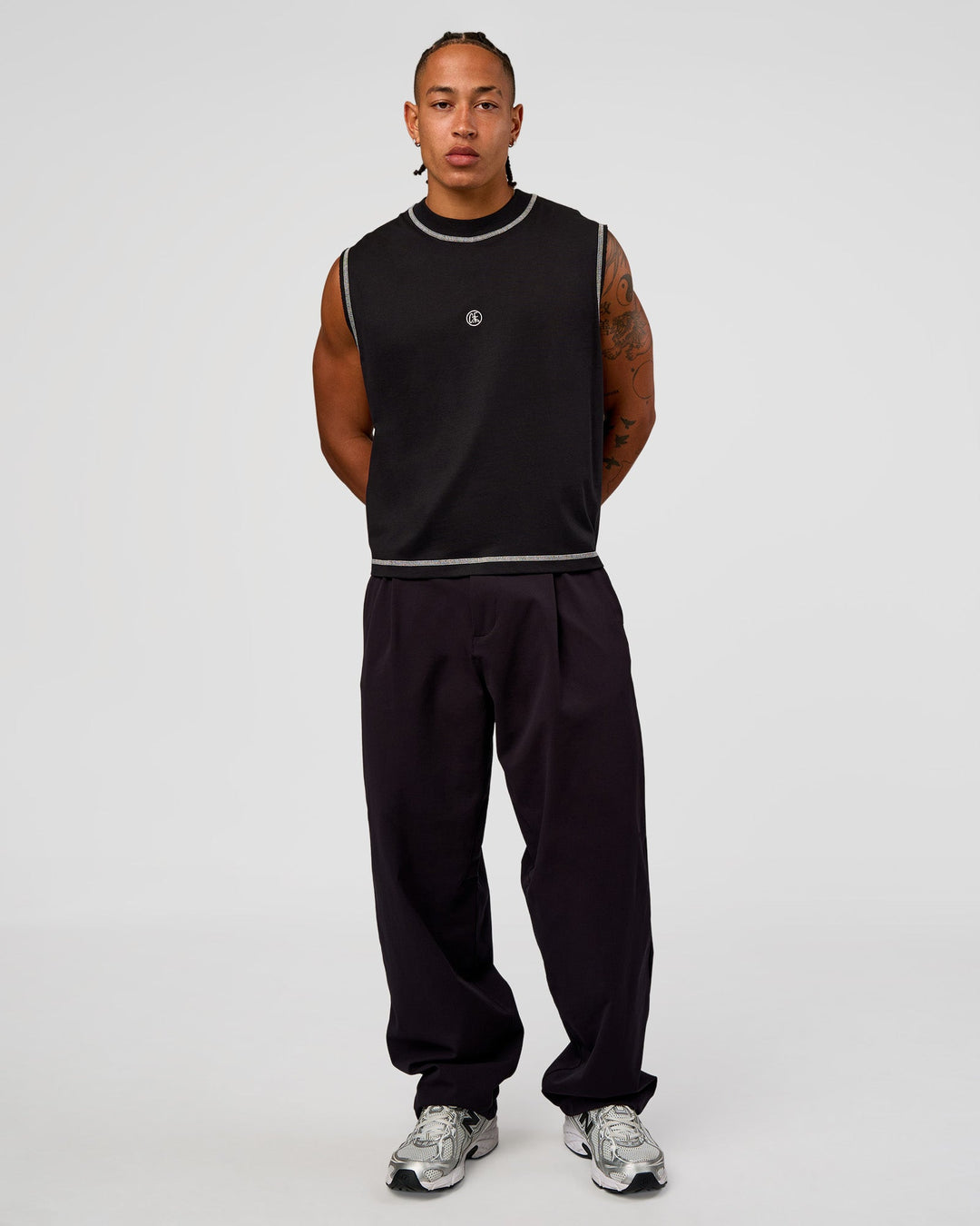 Man wearing CF Unisex Oversized Heavyweight Boxed Tank - Black-CF X LSKD Sport | Model:Malebo | Size:M