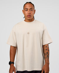 Man wearing CF Unisex Oversized Heavyweight FLXCotton Tee - Clay-CF X LSKD Sport | Model:Malebo | Size:M
