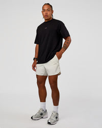Man wearing CFT BNE 26 FLXCotton Oversized Tee in Black | Model:Malebo | Size:M | Thumbnail Index: 4
