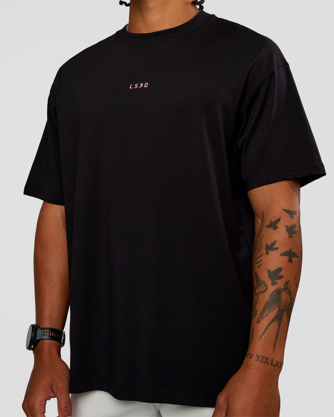 Man wearing CFT BNE 26 FLXCotton Oversized Tee in Black | Model:Malebo | Size:M - view 3