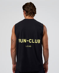 Man wearing Cadence RUN CLUB Muscle Tank - Black-Yellow Fizz | Model:Konnor | Size:M | Thumbnail Index: 0