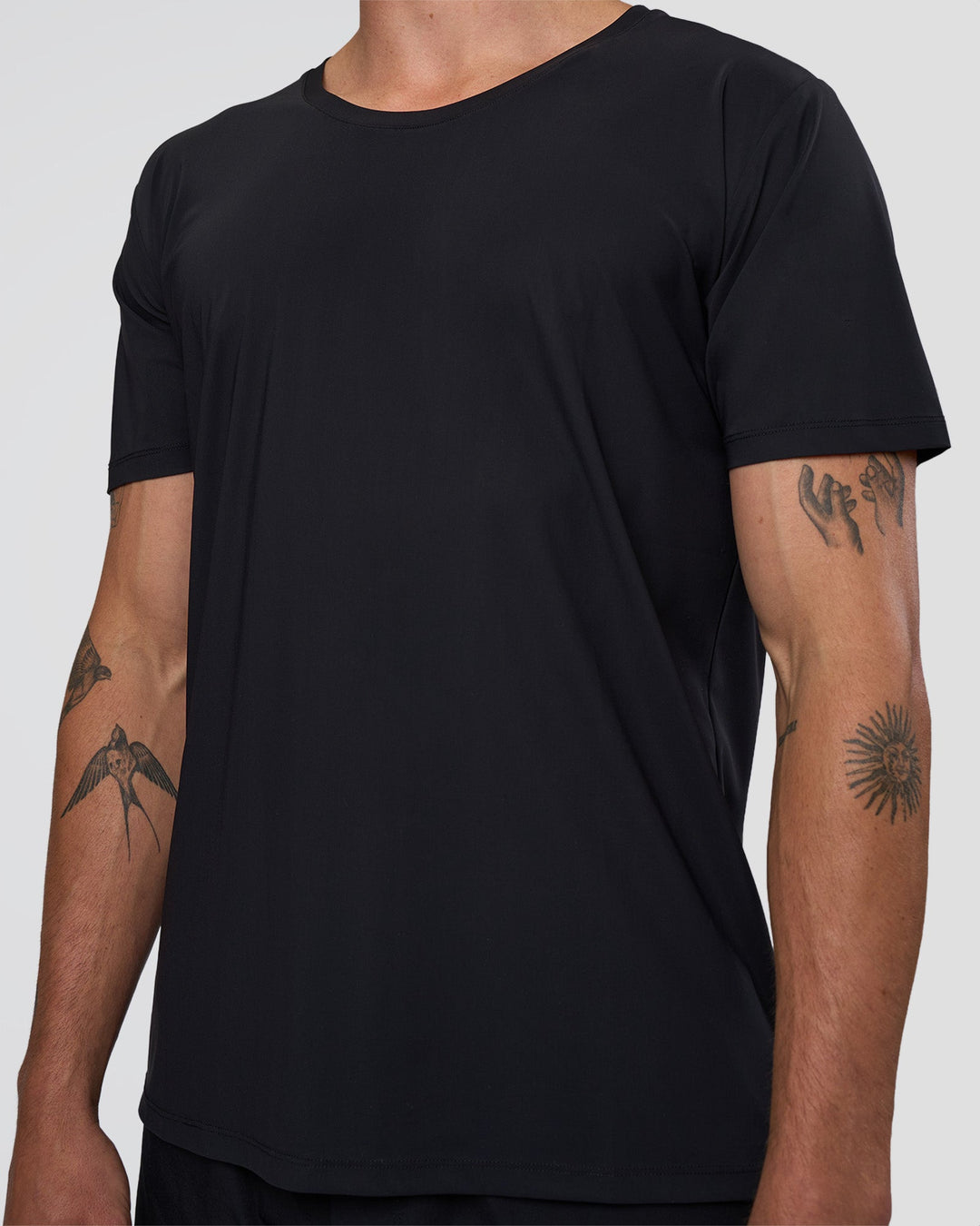 Man wearing Cadence Swift Tee - Black | Model:Konnor | Size:M