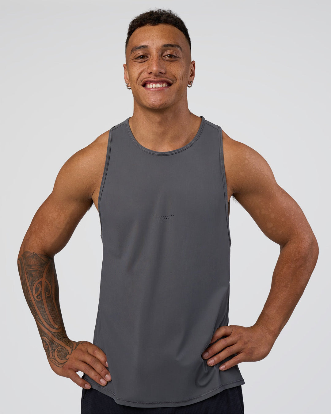 Man wearing Cadence Tank - Dark Storm | Model:Daarian | Size:M