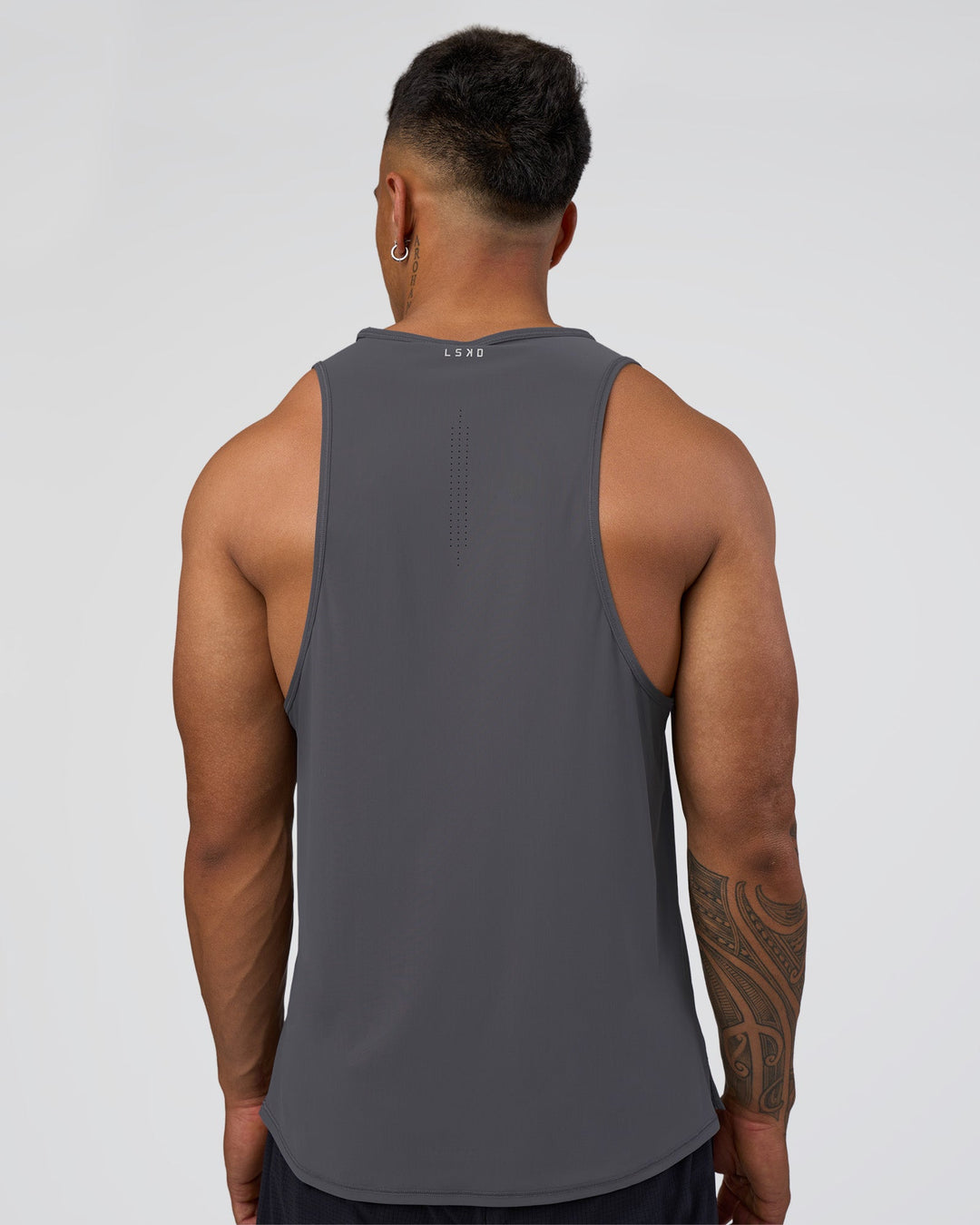 Man wearing Cadence Tank - Dark Storm | Model:Daarian | Size:M