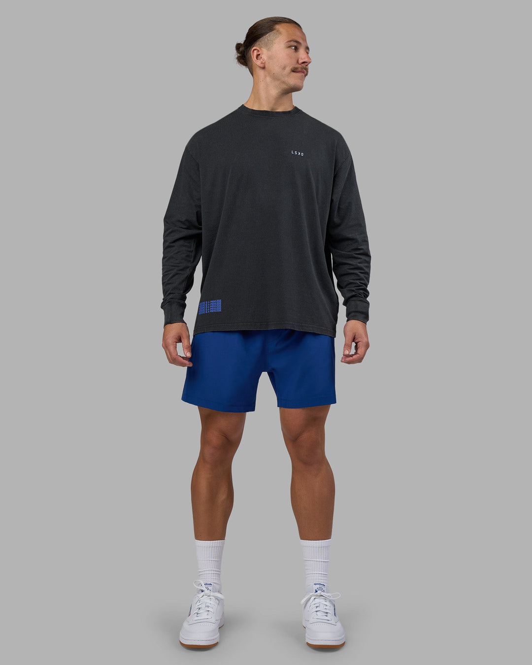 Man wearing Cali FLXCotton Oversized Long Sleeve Tee - Black Washed | Model:Jaiden | Size:M