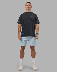 Man wearing Cali FLXCotton Oversized Tee - Black Washed | Model:Jaiden | Size:M