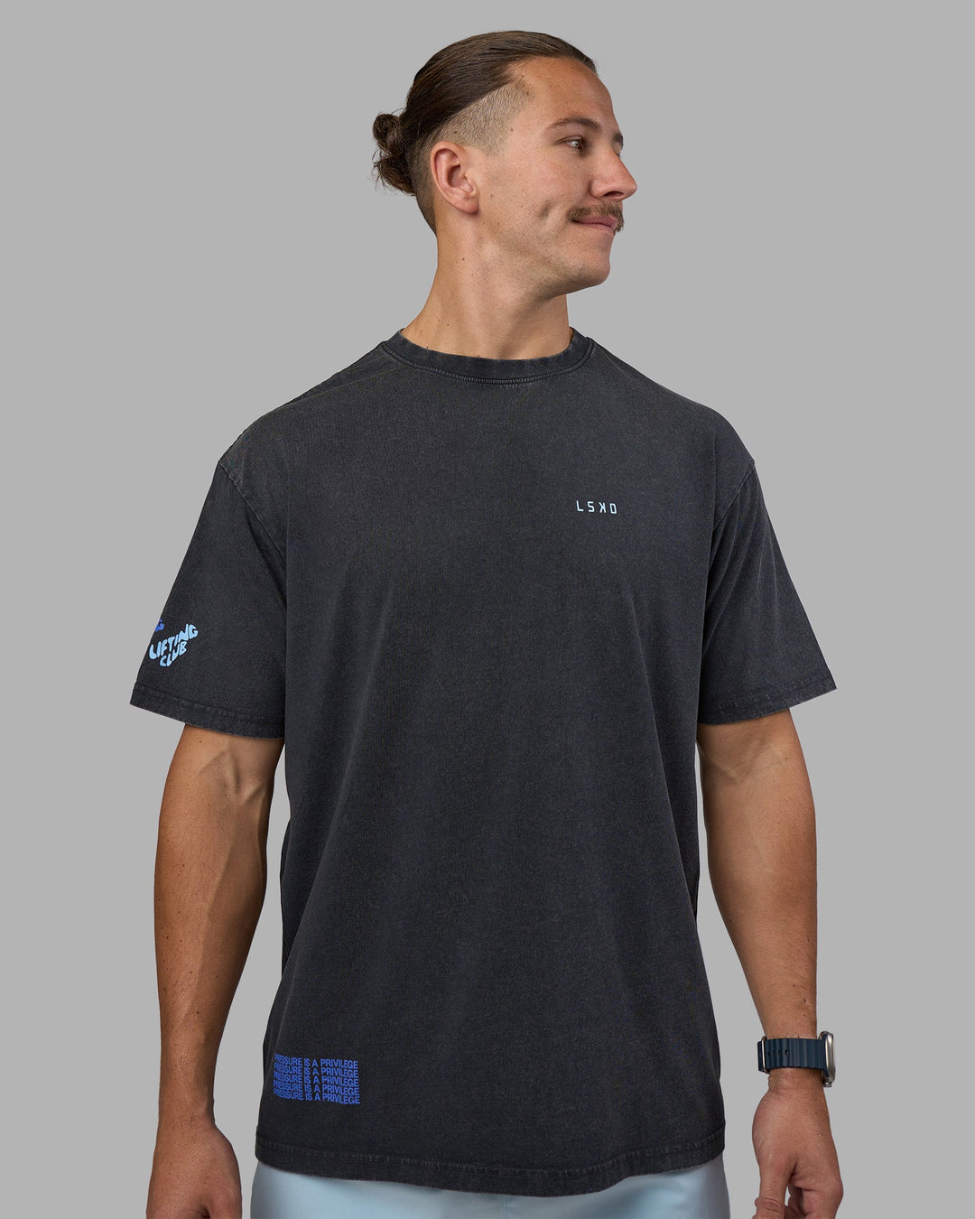 Man wearing Cali FLXCotton Oversized Tee - Black Washed | Model:Jaiden | Size:M