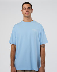 Man wearing Coffee Run FLXCotton Oversized Tee - Open Air-White | Model:Zoran | Size:M