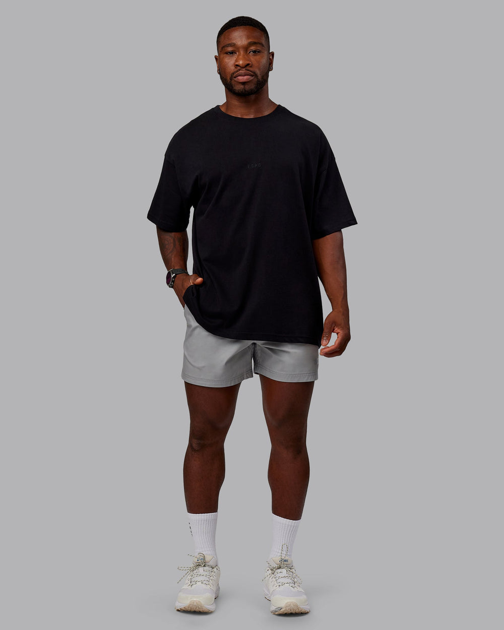 Man wearing Daily 5" Shorts - Circular Grey