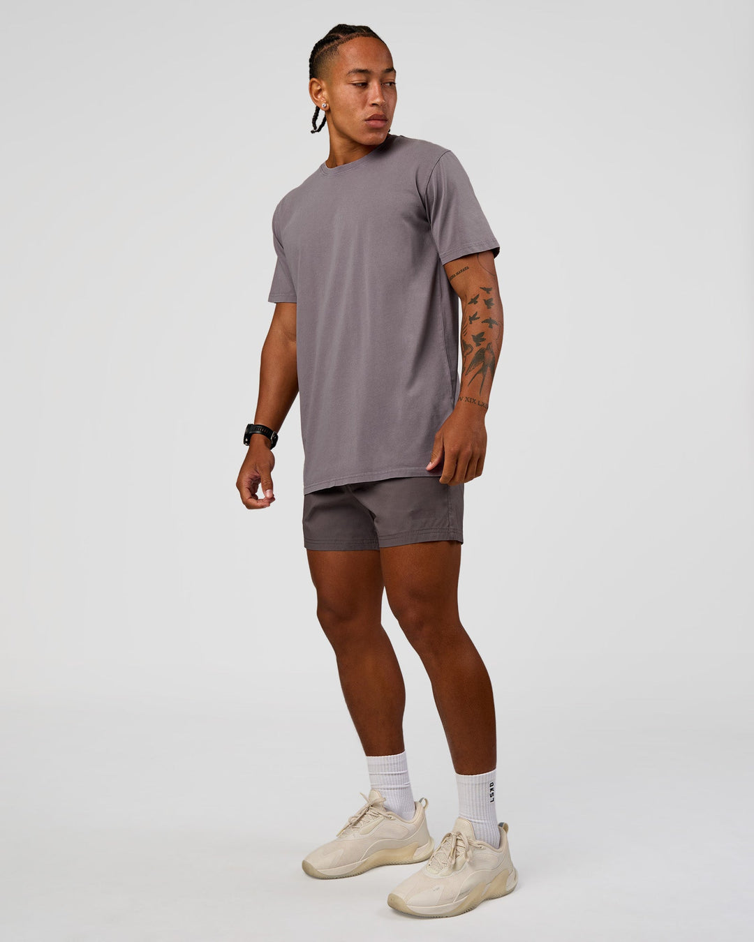 Man wearing Daily 5" Short - Duskstone | Model:Malebo | Size:M