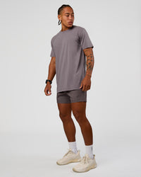 Man wearing Daily 5" Short - Duskstone | Model:Malebo | Size:M
