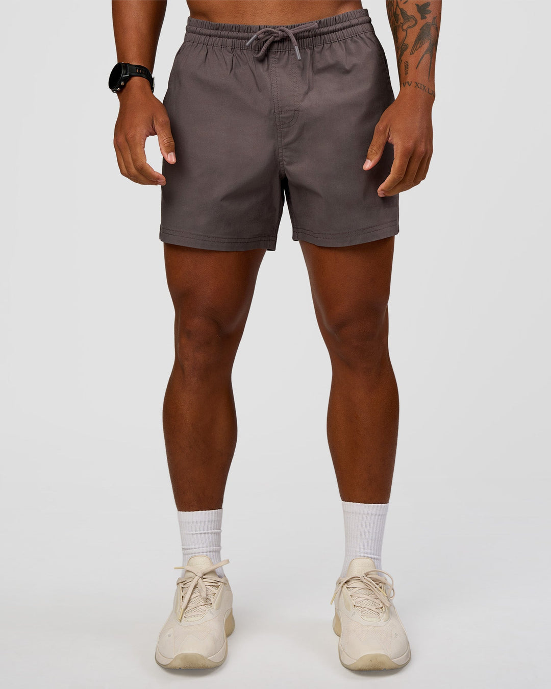 Man wearing Daily 5" Short - Duskstone | Model:Malebo | Size:M