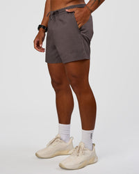 Man wearing Daily 5" Short - Duskstone | Model:Malebo | Size:M
