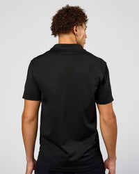 Man wearing Drive Seamless Polo - Black | Model:Leandro | Size:M | Thumbnail Index: 3