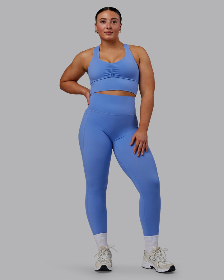 Woman wearing Elixir 7/8 Length Leggings With Pockets - Ultramarine
