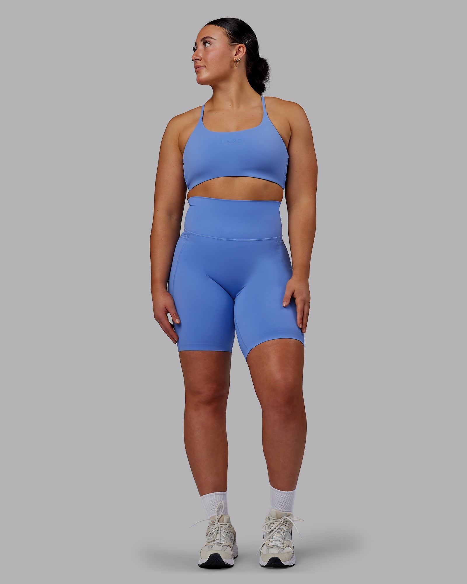Woman wearing Elixir Ultra High-Rise 9" Short Pockets - Ultramarine
