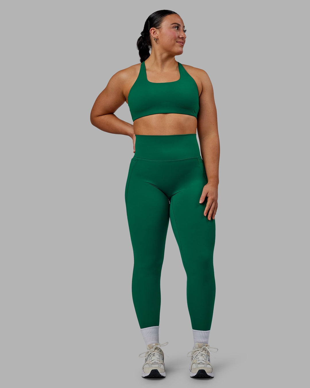 Woman wearing Elixir Full Length Leggings With Pockets - Malachite