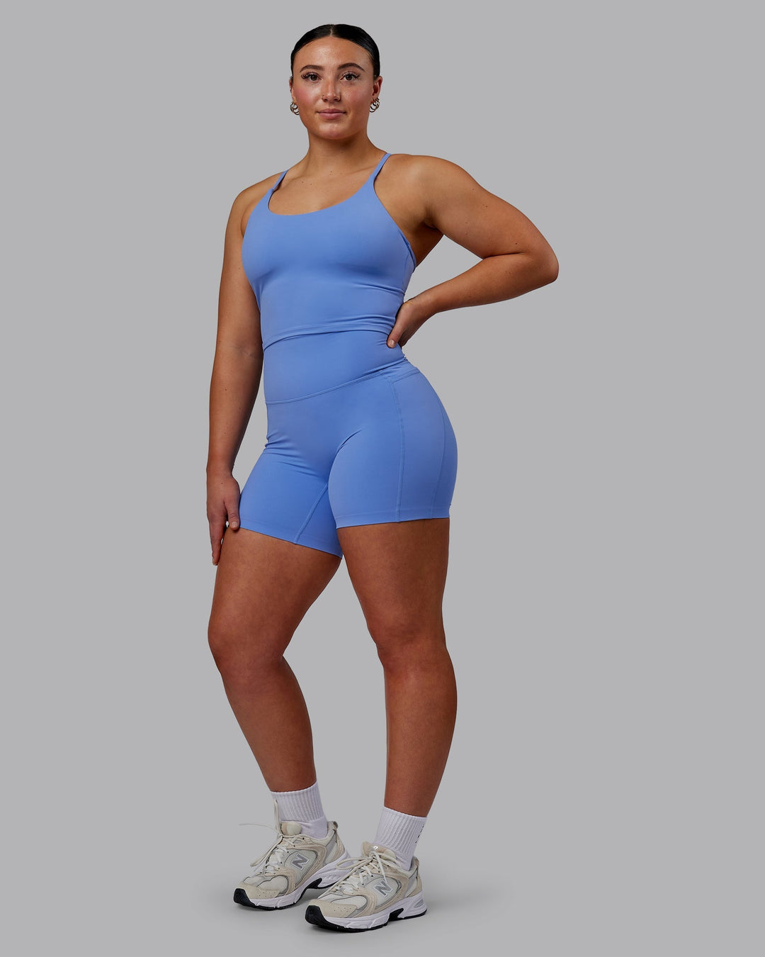 Woman wearing Elixir Mid-Length Shorts with Pockets - Ultramarine