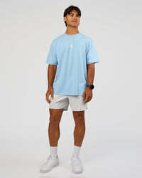 Man wearing Everyday Elevation FLXCotton Oversized Tee - Open Air-Off White | Model:George | Size:M