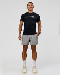 Man wearing Fitstop AeroFLX+ Seamless Tee - Black | Model:Jaiden | Size:M