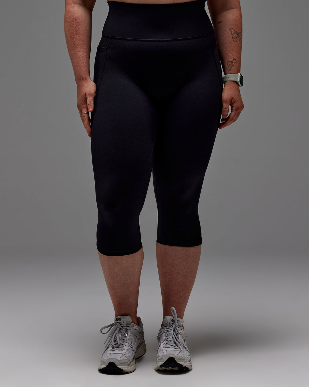 Woman wearing Fusion 3/4 Length Tight with Pockets in Black | Size:M