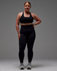 Woman wearing Fusion Ultra High-Rise Full Length Legging Pockets - Black | Model:Caity | Size:M