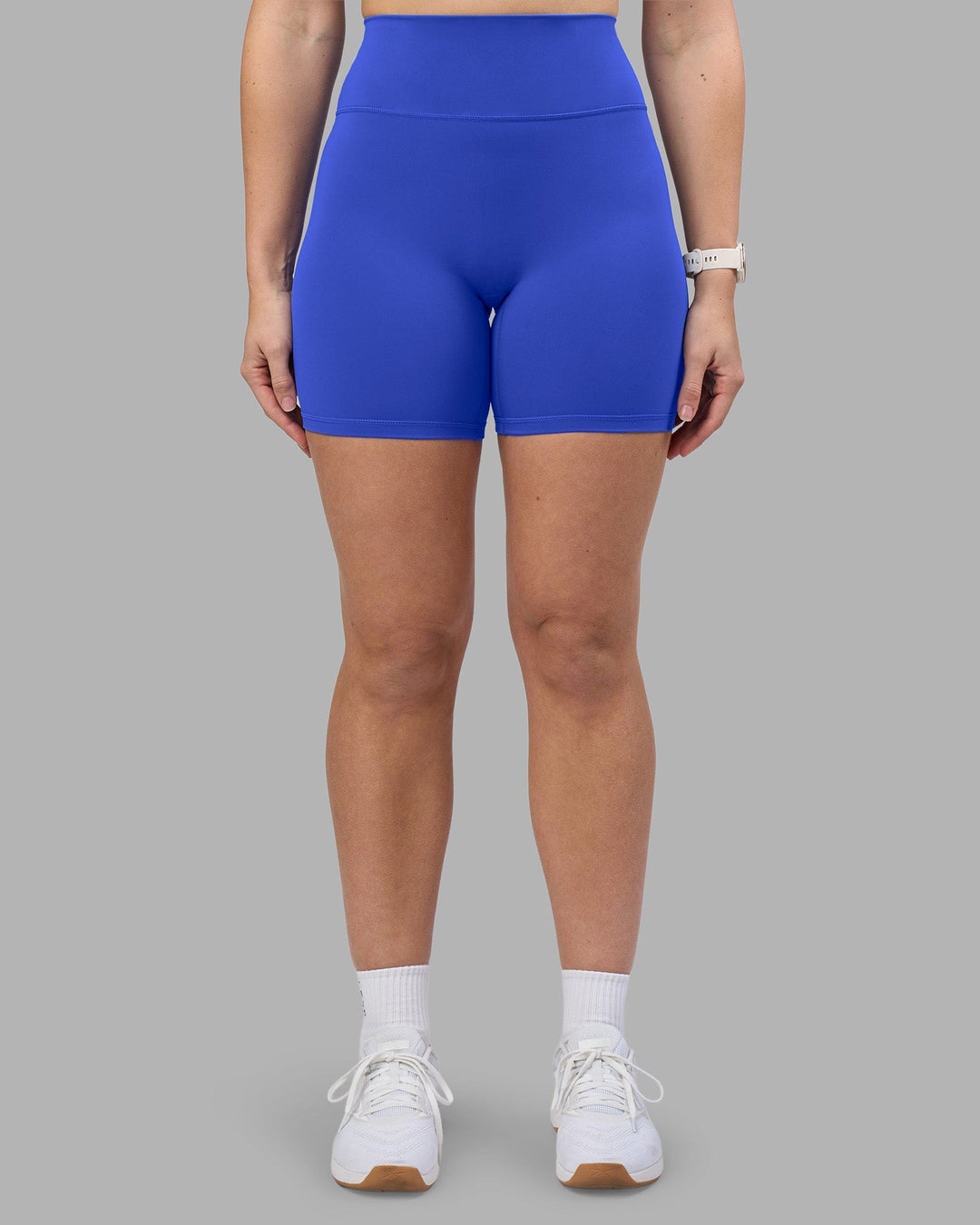 Woman wearing Fusion Ultra High-Rise 6&quot; Short - Power Cobalt | Model:Amy | Size:M