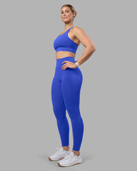Woman wearing Fusion Ultra High-Rise Full Length Legging Pockets - Power Cobalt | Model:Amy | Size:M
