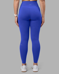 Woman wearing Fusion Ultra High-Rise Full Length Legging Pockets - Power Cobalt | Model:Amy | Size:M