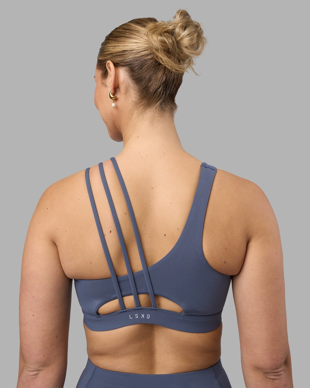 Woman wearing Galvanise Sports Bra 2.0 - Night Shadow | Model:Amy | Size:M