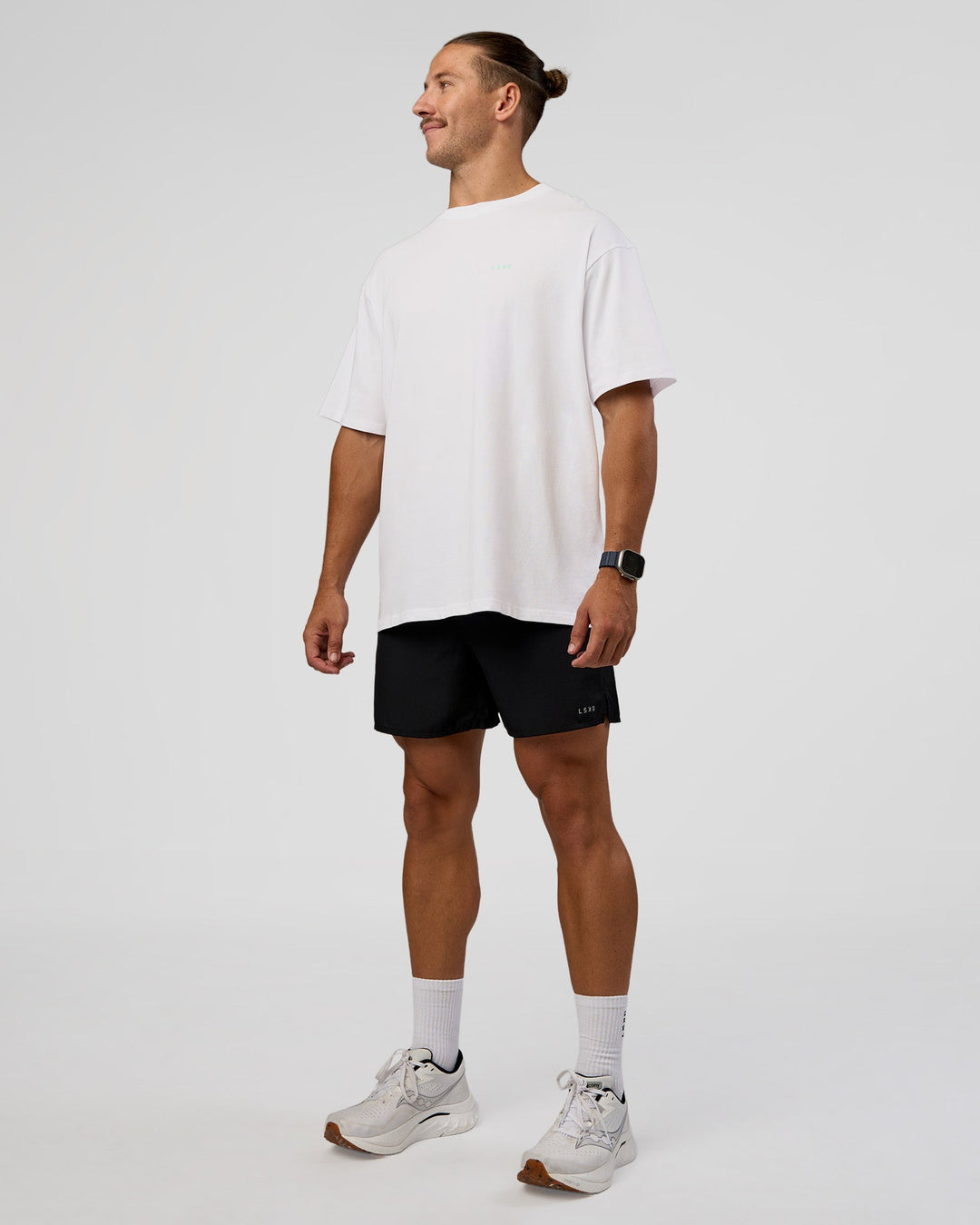  Man wearing High Run FLXCotton Oversized Tee - White-Jelly Mint | Model:Jaiden | Size:M