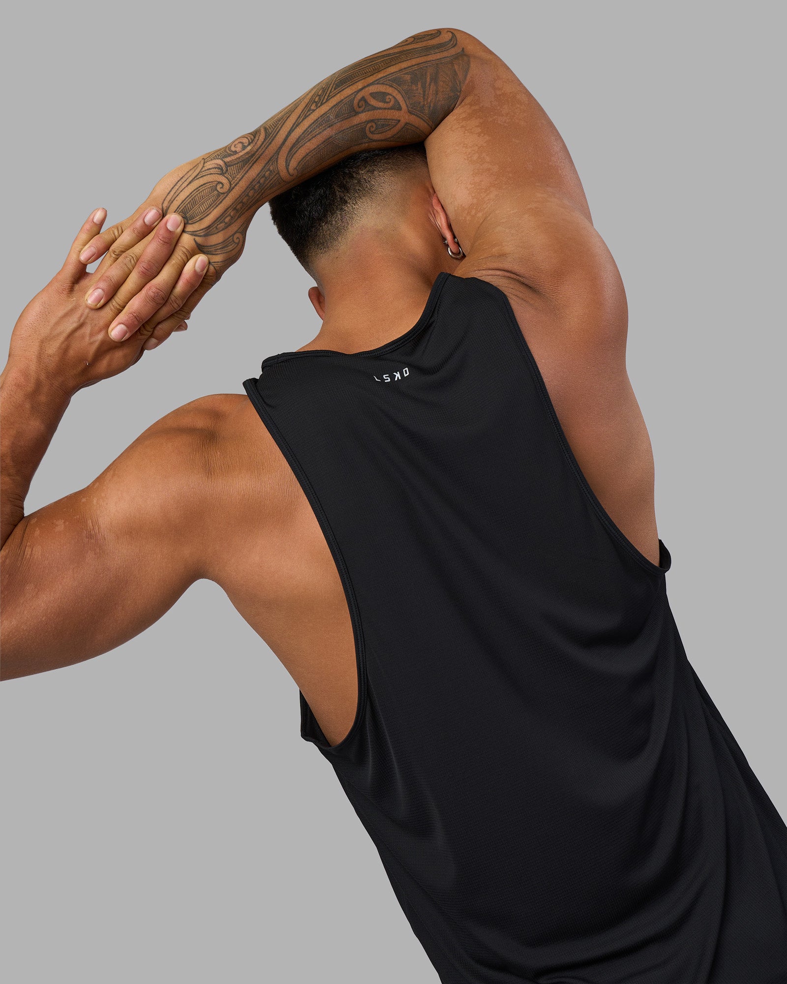 Man wearing LSKD TRD Tank - Black | Model:Daarian | Size:M