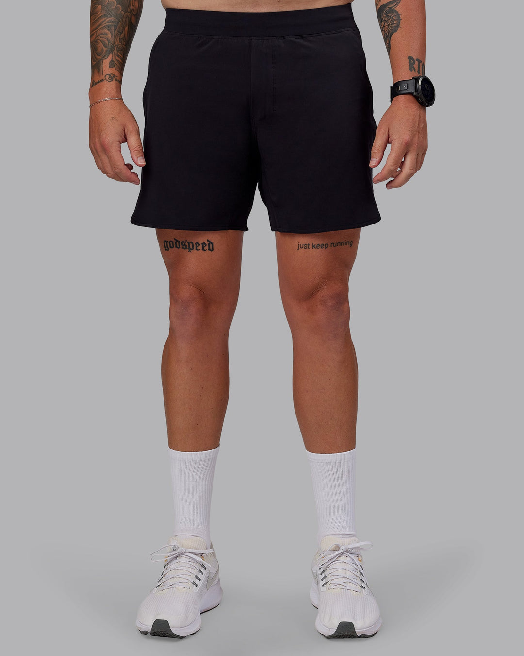 Man wearing Lift Lined 6" Short in Black-Reflective | Size:M