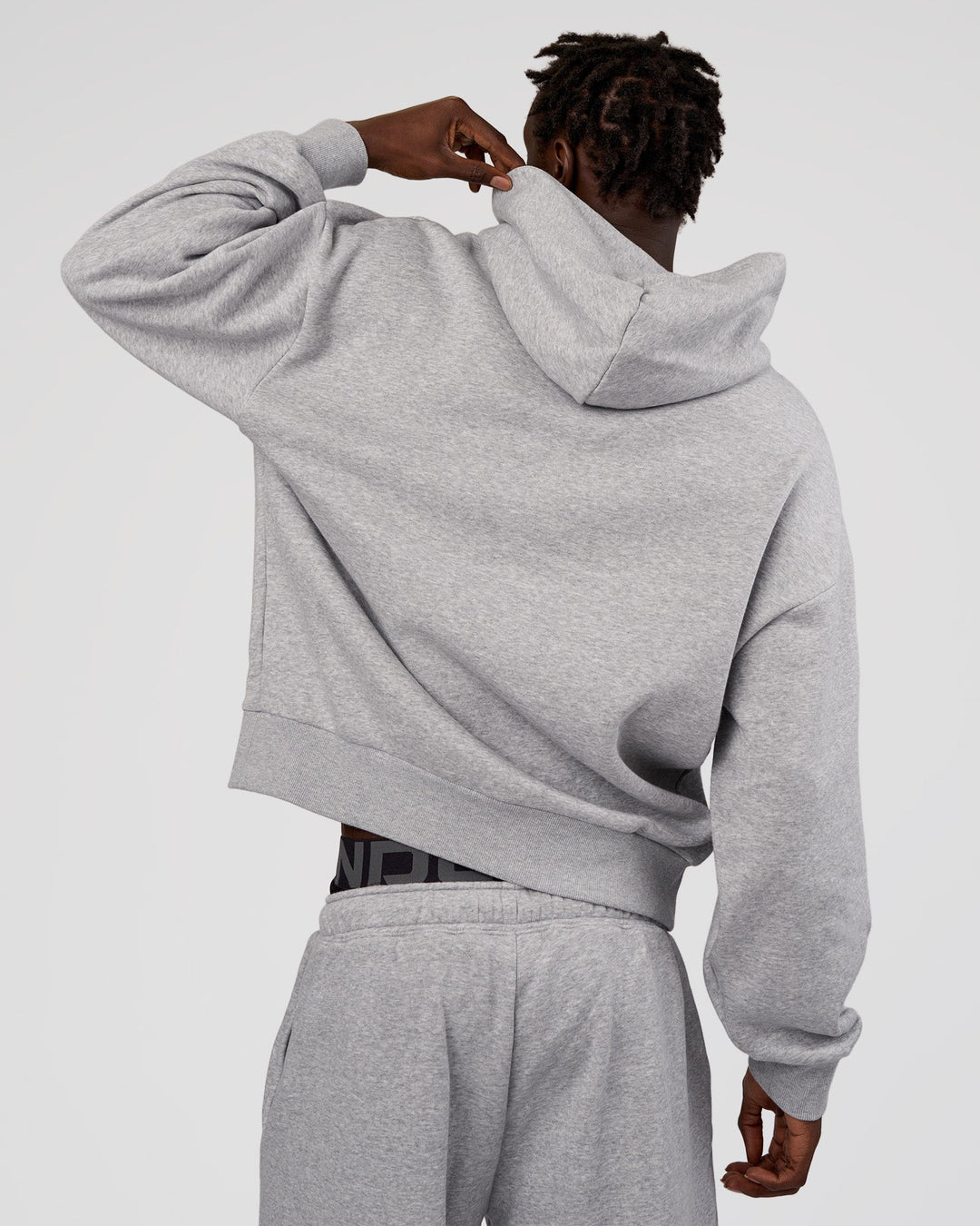 Man wearing MVP Oversized Hoodie - Light Grey Marl | Model:Okello | Size:M