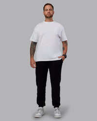 Man wearing MVP Quilted Track Pant - Black-Geometric | Model:Macca | SIze:M