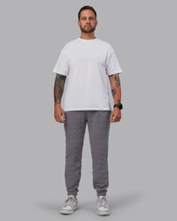 Man wearing MVP Quilted Track Pant - Storm Front-Geometric | Model:Macca | Size:M