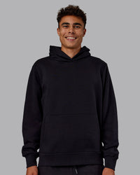 Man wearing MVP Regular Fit Hoodie - Black | Model:Jaxon | Size:M