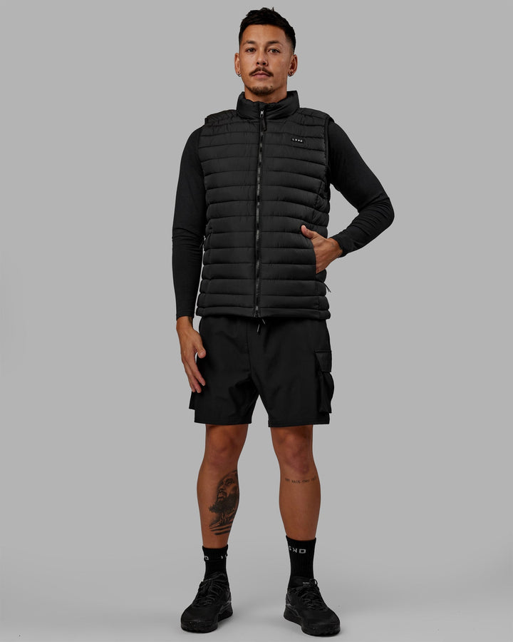 Man wearing All Day Puffer Vest - Black